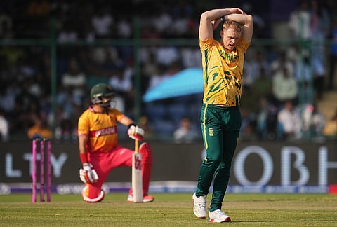 South Africa's Corbin Bosch reacts after a boundary of his delivery during the T20 World Cup cricket match between South Africa and Zimbabwe in New Delhi.
