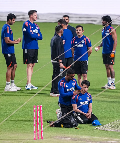 India's Abhishek Sharma, front right, and head coach Gautam Gambhir, bowling coach Morne Morkel, Shivam Dube, Tilak Varma and others during a practice session ahead of an ICC Men's T20 World Cup 2026 cricket match between India and West Indies, at the Eden Gardens, in Kolkata, West Bengal.