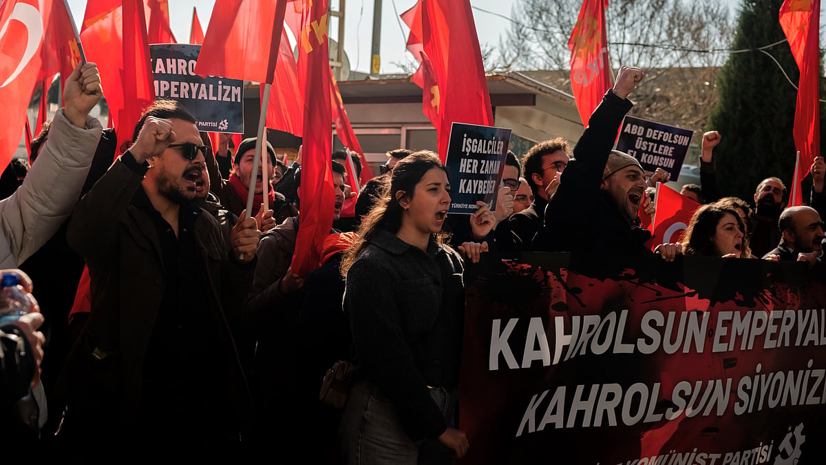 Photo: AP : People chant slogans as they protest against U.S. and Israeli strikes on Iran, outside a NATO base in Izmir, Turkey, Saturday, Feb. 28, 2026.