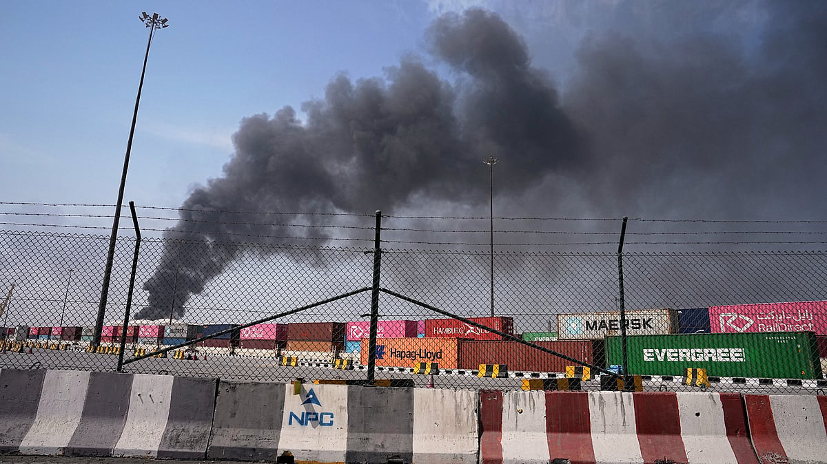 | Photo: AP/Fatima Shbair : Smoke rises after an Iranian drone attack in the port area of Dubai, United Arab Emirates, Sunday, March 1, 2026.