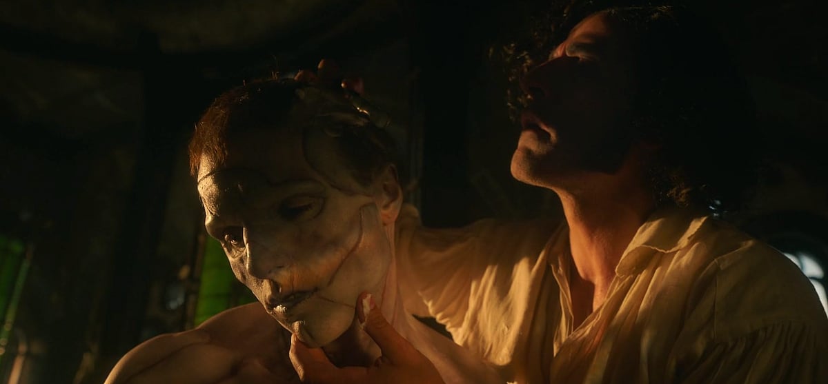 IMDB : A still from Guillermo Del Toro's Frankenstein (2025) featuring the Creature and Victor Frankenstein 
Source: