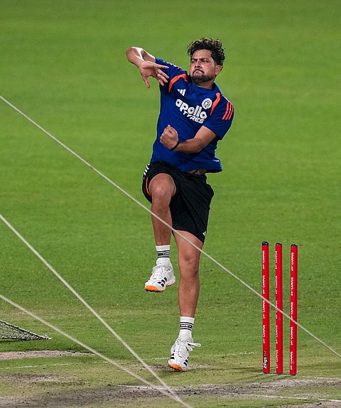 India's Kuldeep Yadav bowls a delivery during a practice session ahead of an ICC Men's T20 World Cup 2026 cricket match between India and West Indies, at the Eden Gardens, in Kolkata, West Bengal.