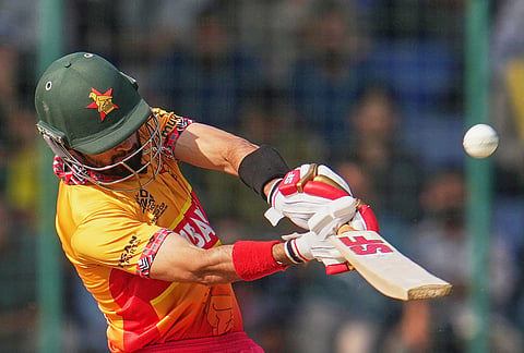 Zimbabwe's captain Sikandar Raza hits a six during the T20 World Cup cricket match between South Africa and Zimbabwe in New Delhi.