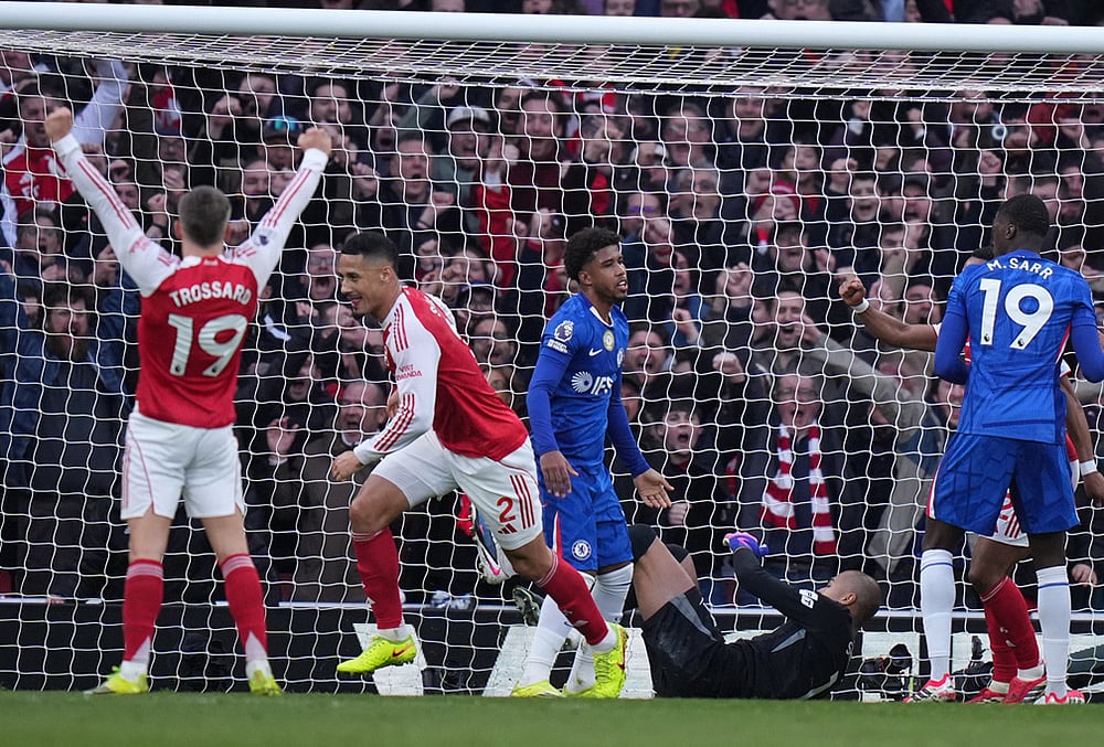 | Photo: AP/Alastair Grant : Arsenal's Leandro Trossard and William Saliba celebrates after a goal during the Premier League soccer match between Chelsea Arsenal in London.
