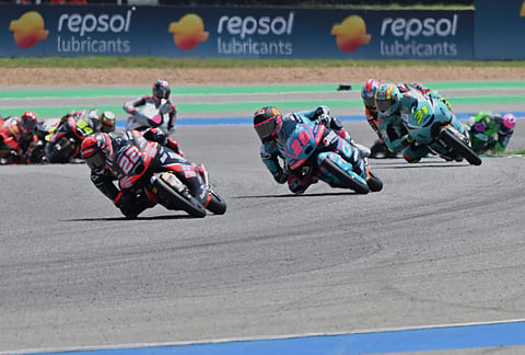 Spain's rider David Almansa of Liqui Moly Dynavolt Intact GP leads the pack of riders during the Moto3 at the Chang International Circuit International Circuit in Buriram, Thailand.