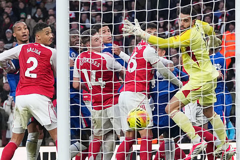 Arsenal's goalkeeper David Raya watches as he's beaten by the ball during the Premier League soccer match between Chelsea Arsenal in London.