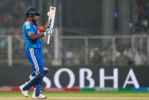 India's Sanju Samson applauds a shot by batting partner Tilak Varma during the T20 World Cup cricket match between India and West Indies in Kolkata.