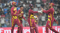 | Photo: AP/Rafiq Maqbool : West Indies' Gudakesh Motie, second from left, celebrates with teammates the wicket of England's Jacob Bethell during the T20 World Cup cricket match between England and West Indies in Mumbai, India, Wednesday, Feb. 11, 2026. 