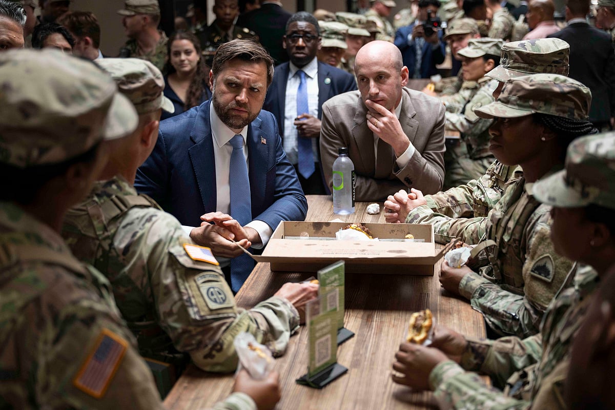 | Imago | : Washington, Dc, United States: U.S Vice President JD Vance, left, and White House Deputy Chief of Staff Stephen Miller, center, chat with National Guard members
