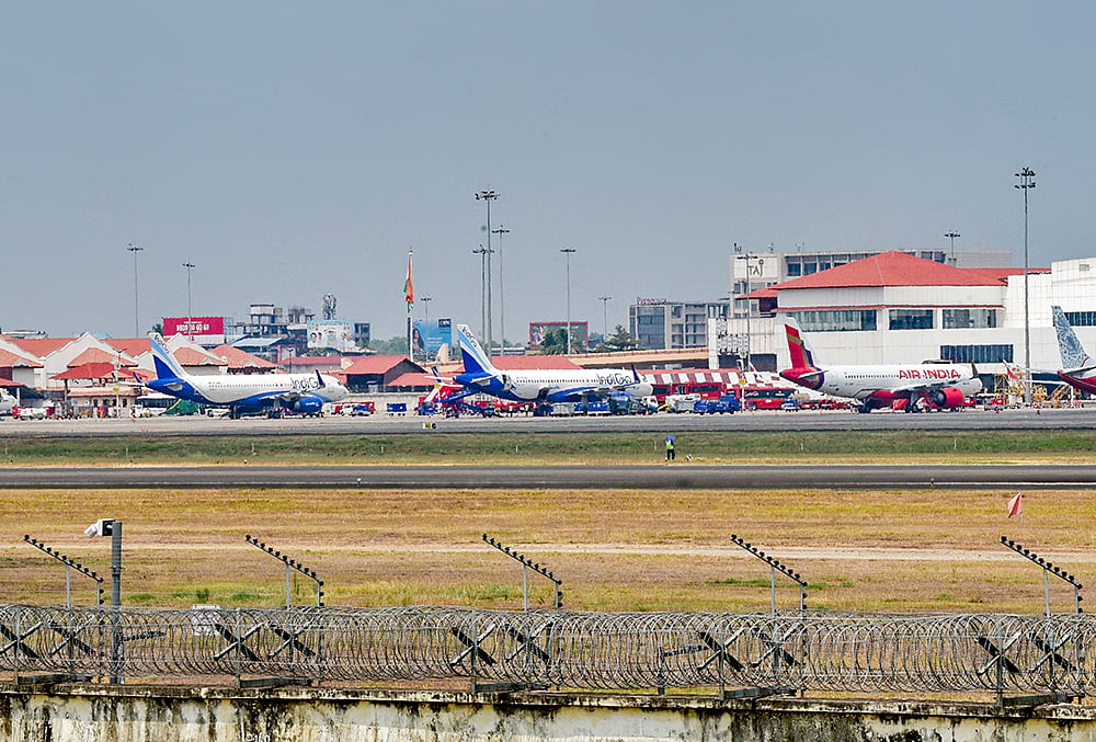 | Photo: PTI : Passenger aircrafts at Kochi airport, Tuesday, March 3, 2026. Flight operations have been disrupted due to the closure of airspaces in the Middle East amid the ongoing conflict involving US, Israel and Iran. 