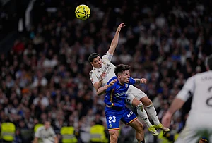 | Photo: AP/Manu Fernandez : Getafe's Adrian Liso jumps for the ball against Real Madrid's Brahim Diaz during a Spanish La Liga soccer match between Real Madrid and Getafe in Madrid, Spain.