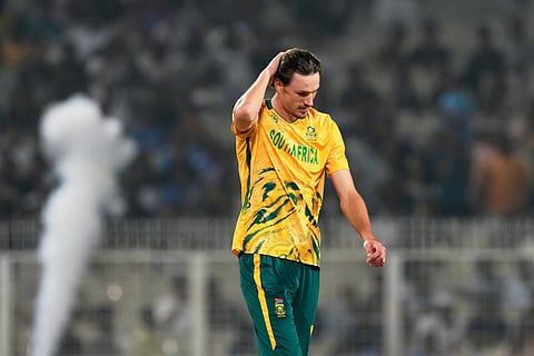 South Africa's Marco Jansen reacts after getting hit for a six during the first T20 World Cup cricket semifinal match between New Zealand and South Africa in Kolkata.
