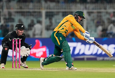 South Africa's Quinton de Kock plays a shot during the first T20 World Cup cricket semifinal match between New Zealand and South Africa in Kolkata.