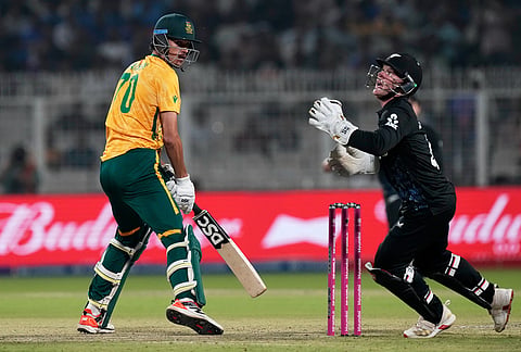 South Africa's Marco Jansen, left, looks on after playing a shot during the first T20 World Cup cricket semifinal match between New Zealand and South Africa in Kolkata.