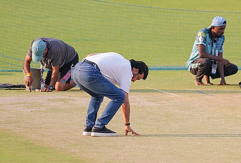 Former cricketer and Cricket Association of Bengal President Sourav Ganguly inspects the pitch during a training session ahead of the ICC Men's T20 World Cup 2026 first semifinal cricket match between New Zealand and South Africa, at Eden Gardens, in Kolkata.