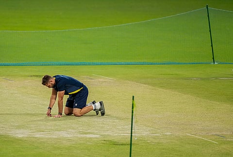 South Africa's captain Aiden Markram inspects the pitch during a training session ahead of the ICC Men's T20 World Cup 2026 first semifinal cricket match between New Zealand and South Africa, at Eden Gardens, in Kolkata.