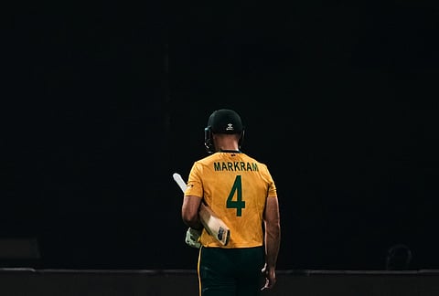 South Africa's captain Aiden Markram leaves the ground after losing his wicket during the first T20 World Cup cricket semifinal match between New Zealand and South Africa in Kolkata.