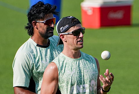 New Zealand's Ish Sodhi, left, with teammate during a training session ahead of the ICC Men's T20 World Cup 2026 first semifinal cricket match between New Zealand and South Africa, at Eden Gardens, in Kolkata.
