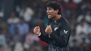 AP : New Zealand's Rachin Ravindra celebrates the wicket of England's Sam Curran during their T20 World Cup match in Colombo.