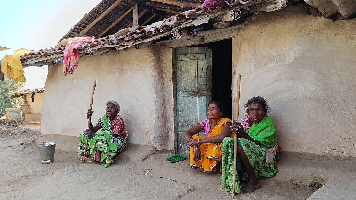 File Photo : Peiro Devi (middle) and other women who were forced to put their hands into boiling water to prove they were not witches