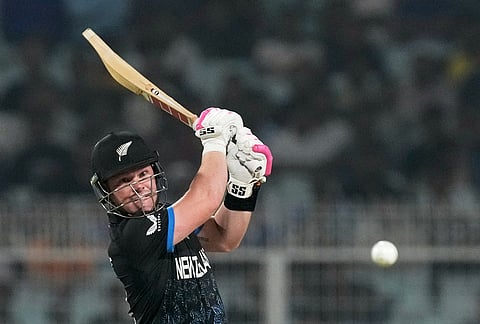 New Zealand's Tim Seifert plays a shot during the first T20 World Cup cricket semifinal match between New Zealand and South Africa in Kolkata.