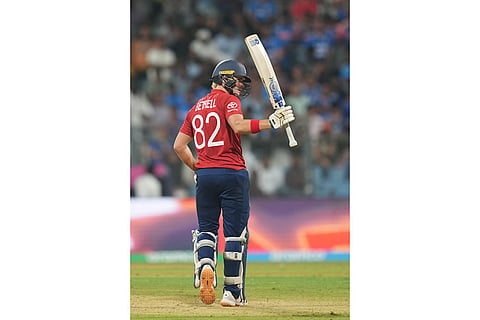 England's Jacob Bethell celebrates after scoring fifty runs during the T20 World Cup cricket semi-final match between India and England in Mumbai, India.