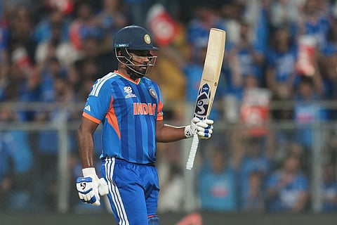 India's Sanju Samson celebrates after scoring fifty runs during the T20 World Cup cricket semi-final match between India and England in Mumbai, India.