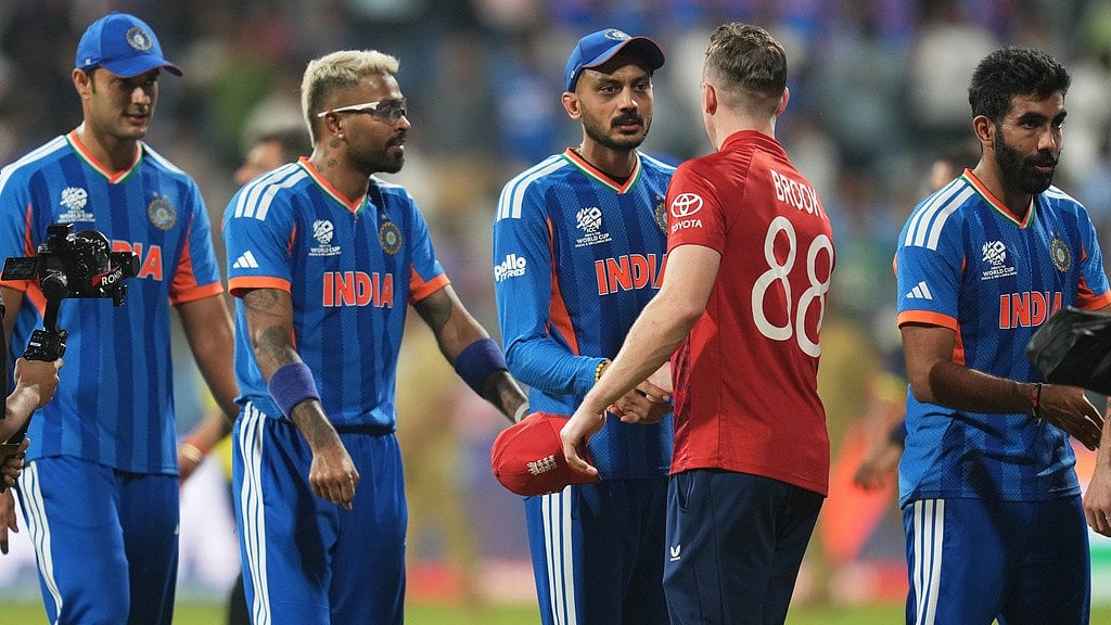 AP Photo/Rafiq Maqbool : England's captain Harry Brook, second right, greets Indian players at the end of the T20 World Cup cricket semi-final match between India and England in Mumbai, India, Thursday, March 5, 2026. 