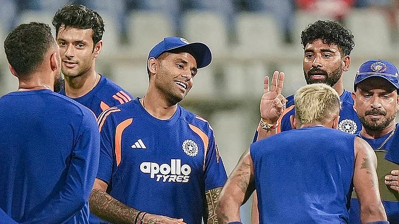 PTI : India's captain Suryakumar Yadav, centre, with teammates during a training session ahead of the ICC T20 World Cup 2026 semi-final against England in Mumbai.