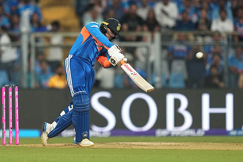 India's Abhishek Sharma plays a shot during the T20 World Cup cricket semi-final match between India and England in Mumbai, India.
