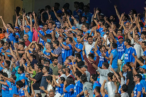 Fans cheer in the stands during the ICC Men's T20 World Cup 2026 second semifinal cricket match between India and England, at the Wankhede Stadium, in Mumbai, Maharashtra.