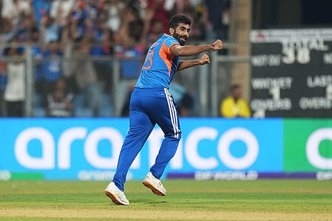 India's Jasprit Bumrah celebrates the dismissal of England's captain Harry Brook during the T20 World Cup cricket semi-final match between India and England in Mumbai, India.