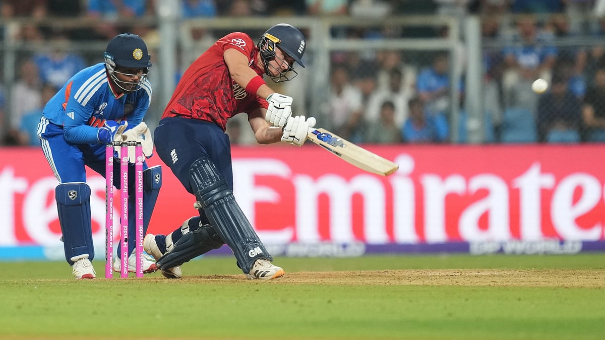 AP Photo/Rafiq Maqbool : England's Jacob Bethell plays a shot during the T20 World Cup cricket semi-final match between India and England in Mumbai, India, Thursday, March 5, 2026. 