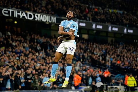 Manchester City's Antoine Semenyo celebrates after scoring the opening goal during the English Premier League soccer match between Manchester City and Nottingham Forest in Manchester, England.