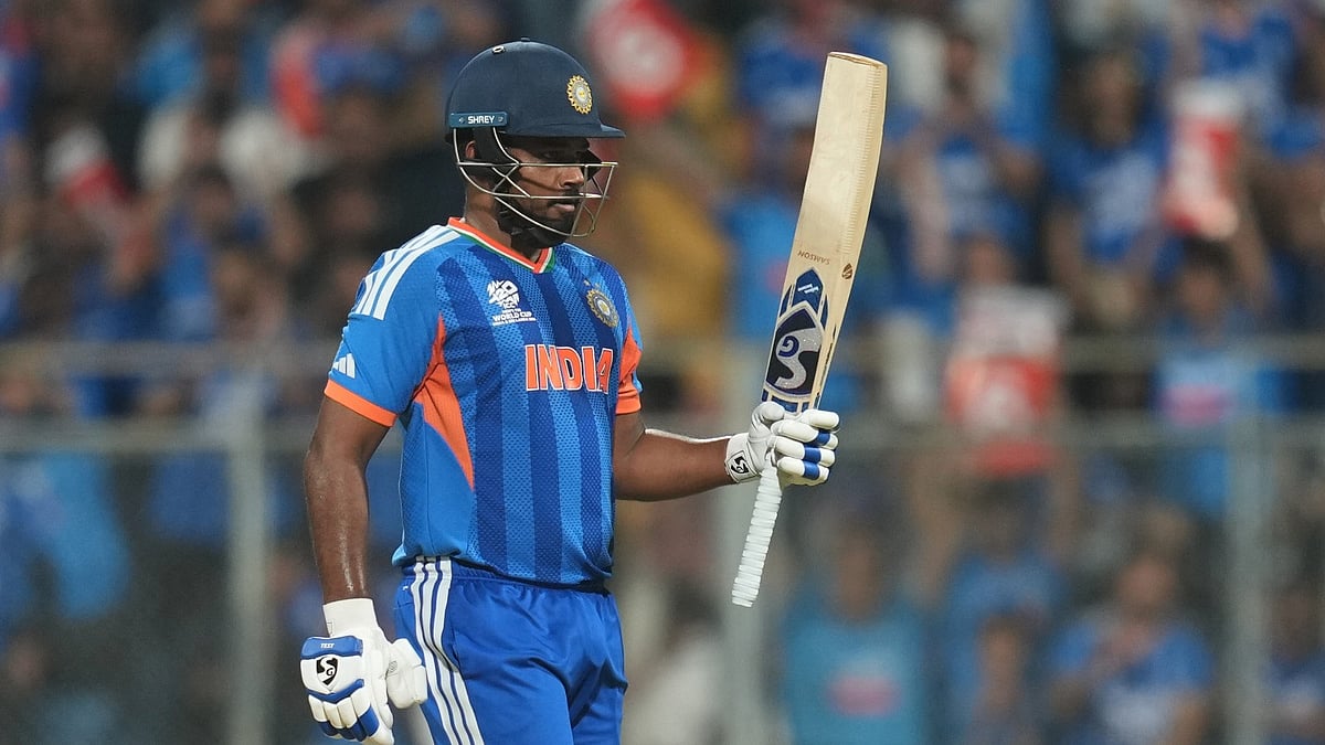 AP Photo/Rafiq Maqbool : India's Sanju Samson celebrates after scoring fifty runs during the T20 World Cup cricket semi-final match between India and England in Mumbai, India, Thursday, March 5, 2026. 