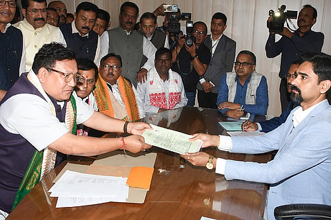 United People’s Party Liberal (UPPL) President Pramod Boro, left, in the presence of Union Minister Sarbananda Sonowal, files his nomination papers for the Rajya Sabha polls, in Guwahati.