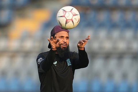 England's Adil Rashid attends a training session ahead of their T20 World Cup cricket semi final match against India in Mumbai.