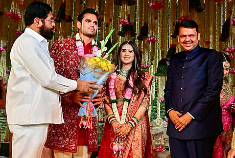 Maharashtra Chief Minister Devendra Fadnavis and state Deputy Chief Minister Eknath Shinde during the wedding ceremony of cricketer Sachin Tendulkar’s son Arjun Tendulkar and industrialist Ravi Ghai’s granddaughter Saaniya Chandhok, in Mumbai. 