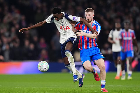 Tottenham Hotspur's Pape Matar Sarr, left, and Crystal Palace's Adam Wharton in action during the English Premier League soccer match between Tottenham Hotspur and Crystal Palace in London, Thursday March 5, 2026. ()