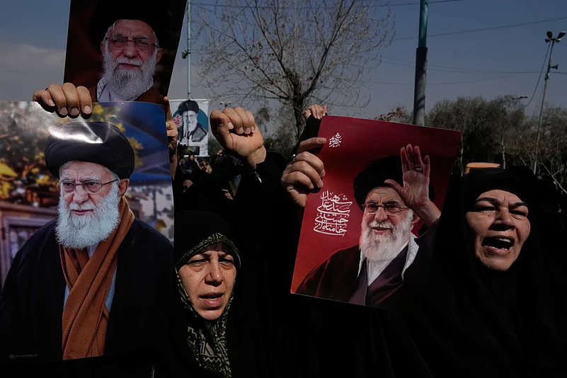 Pro-government demonstrators of the late Iranian Supreme Leader Ayatollah Ali Khamenei