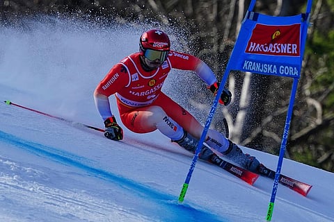Switzerland's Loic Meillard competes during an alpine ski, men's World Cup giant slalom, in Kranjska Gora, Slovenia.