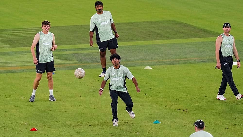 Photo: PTI/Shailendra Bhojak : New Zealand's Rachin Ravindra, front centre, Ish Sodhi, back centre, Lockie Ferguson, right, and others during a practice session ahead of the ICC Men's T20 World Cup 2026 final cricket match between India and New Zealand, at the Narendra Modi Stadium, in Ahmedabad, Gujarat.