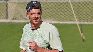 | Photo: PTI/Manvender Vashist Lav : New Zealand's captain Mitchell Santner during a training session ahead of the ICC Men's T20 World Cup 2026 first semifinal cricket match between New Zealand and South Africa, at Eden Gardens, in Kolkata.