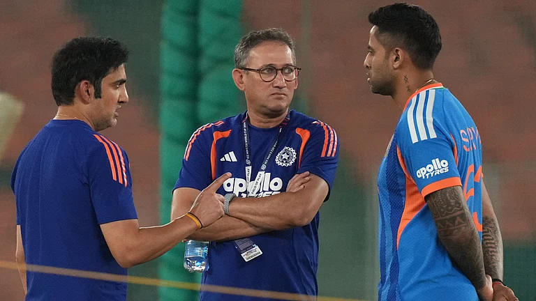 India's head coach Gautam Gambhir, left, Chief Selector Ajit Agarkar, center, and India's captain Suryakumar Yadav talks during a practice session ahead of the T20 World Cup cricket final match against New Zealand in Ahmedabad, India, Saturday, March 7, 2026. - | Photo: AP/Ajit Solanki