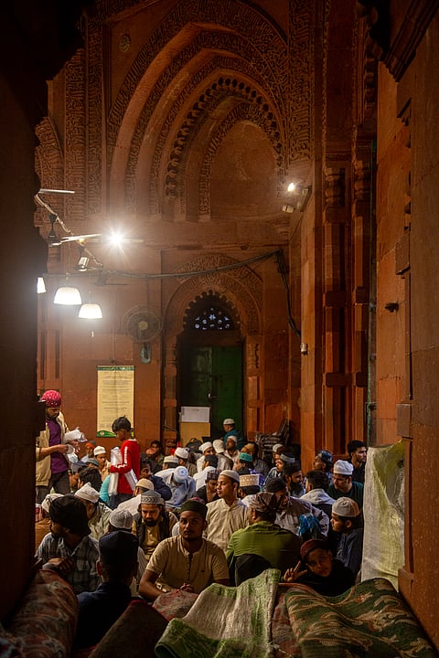 View from the women’s section at Nizamuddin Dargah toward the main prayer hall, which is reserved for men.