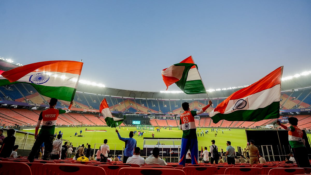 PTI : Fans wave the national flag on the eve of the ICC T20 World Cup 2026 final between India and New Zealand, at the Narendra Modi Stadium in Ahmedabad.