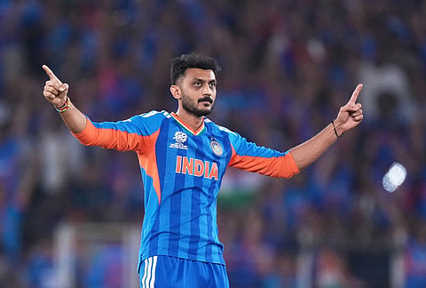 India's Axar Patel celebrates the wicket of New Zealand's Finn Allen during the T20 World Cup cricket final match between India and New Zealand in Ahmedabad.
