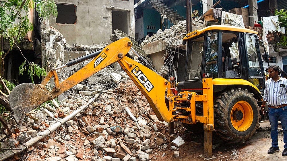 Representative image : Bulldozer Action in Uttam Nagar: MCD Demolishes Illegal Portions of Accused’s House in Holi Clash Murder Case
