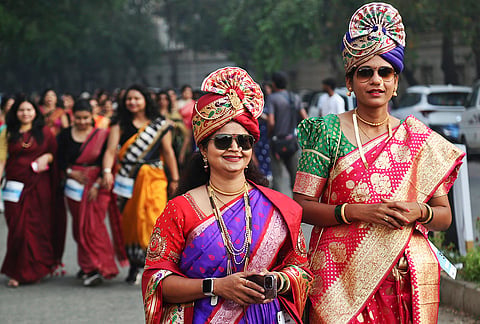Women participate in a 'Saree Walkathon 2026' on the occasion of International Women's Day, in Thane, Maharashtra. Participants walked in traditional sarees to promote empowerment and handloom traditions. 