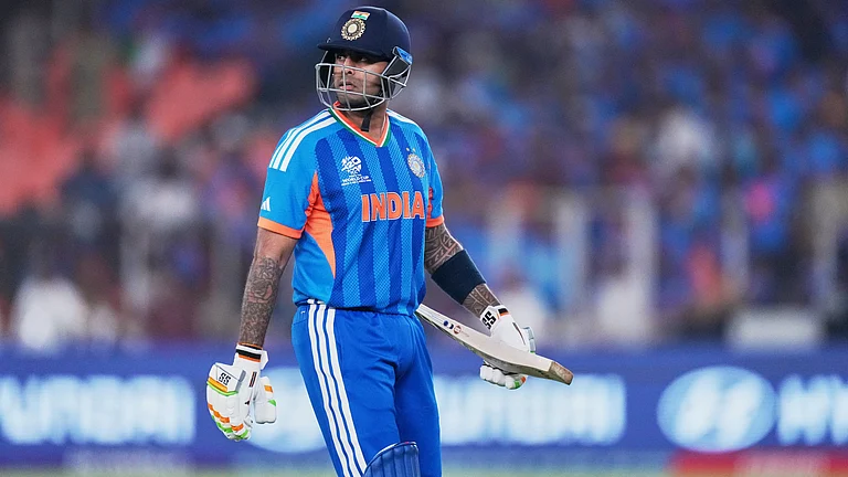 India's captain Suryakumar Yadav leaves the ground after losing his wicket during the T20 World Cup cricket final match between India and New Zealand in Ahmedabad, India, Sunday, March 8, 2026 - (AP Photo/Ajit Solanki)